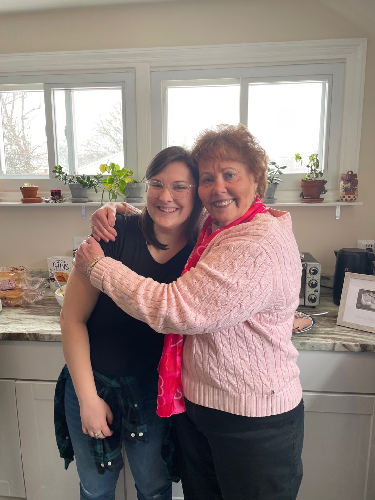 Rebecca shares the good news with her grandmother.