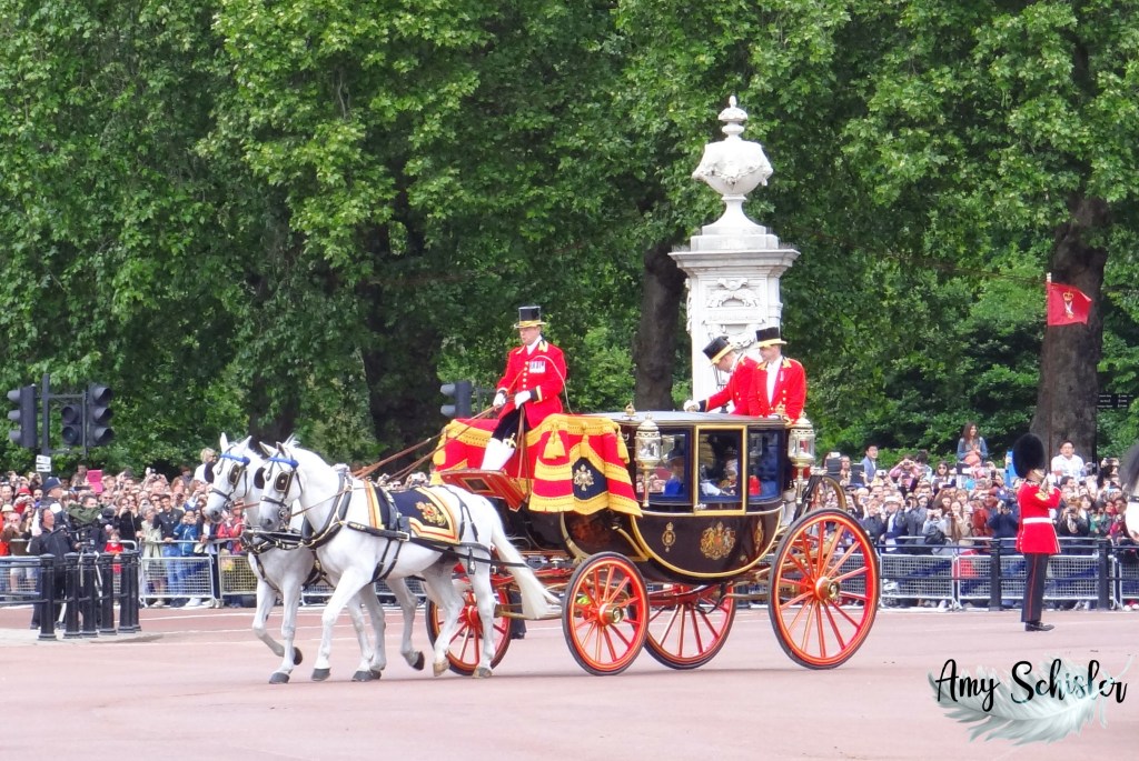 The Queen arrives at Buckingham Palace in 2013.