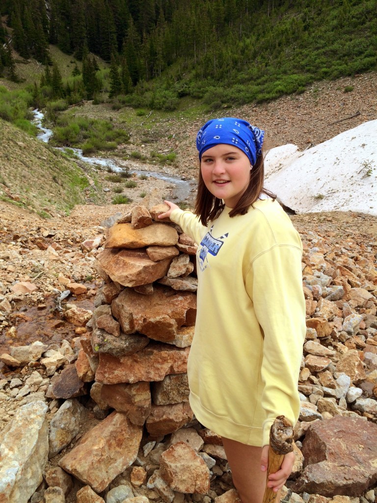 Katie adds to the cairn