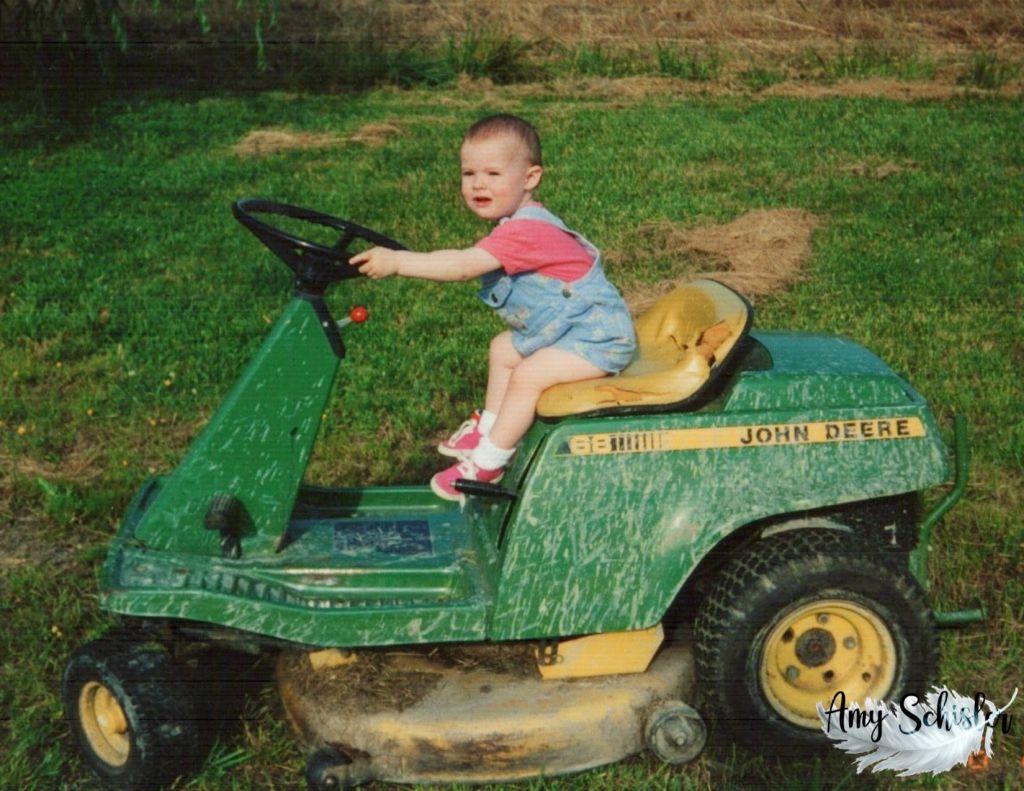 Baby Rebecca on a tractor