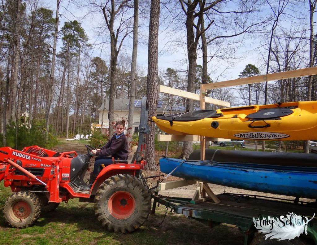 Teen Rebecca on a tractor